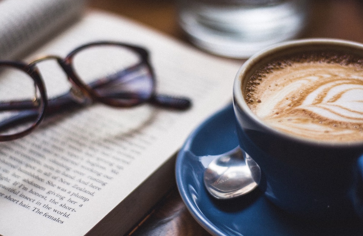 Book and coffee. Image: Unsplash - Harry Brewer