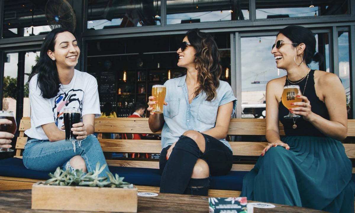 Woman drinking together