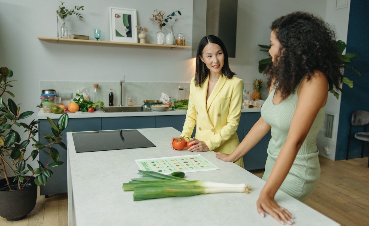 Health coach helping client with meal plan