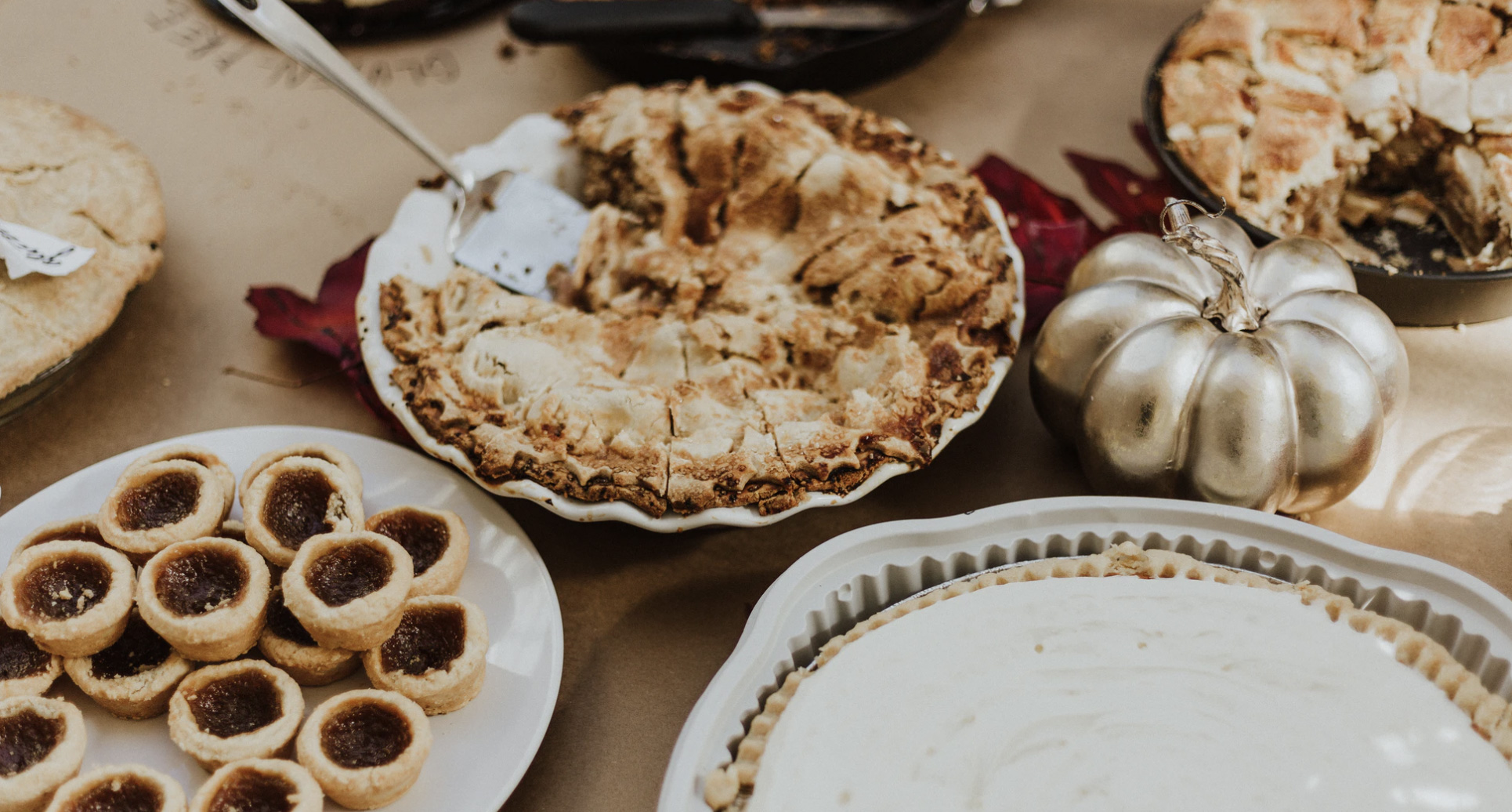 Thanksgiving pies at dinner table. 