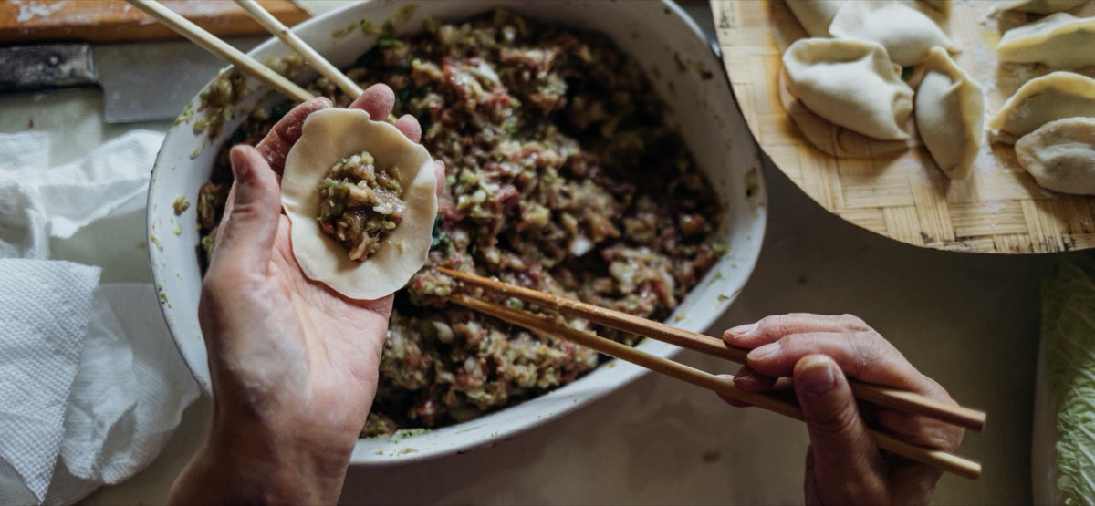 Grandmother making a traditional recipe at home.