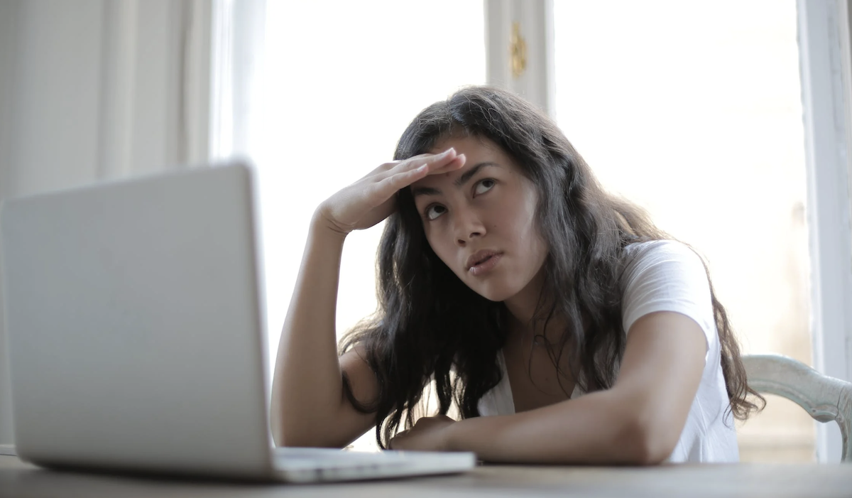 Woman irritable at computer