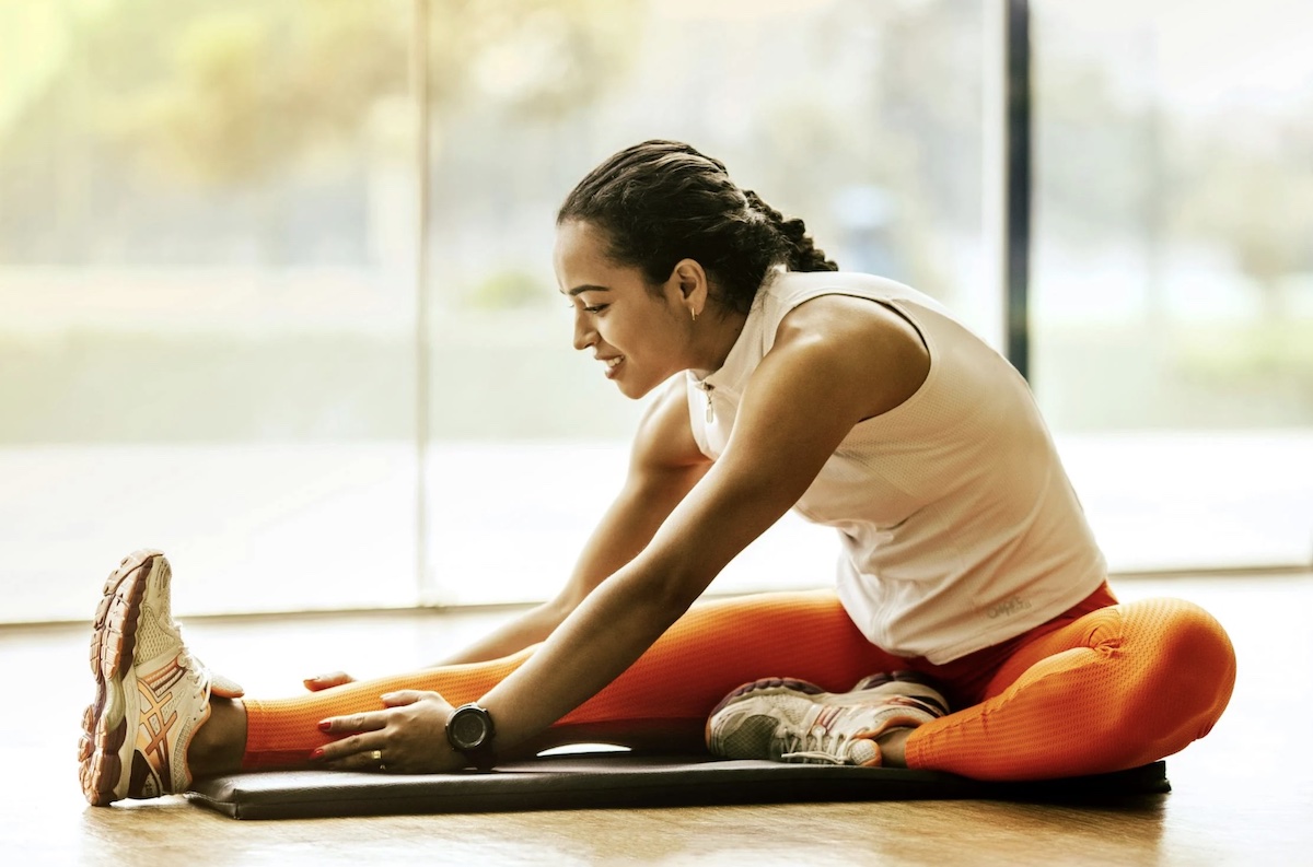 Female stretching. Image: Pexels - Jonathan Borba