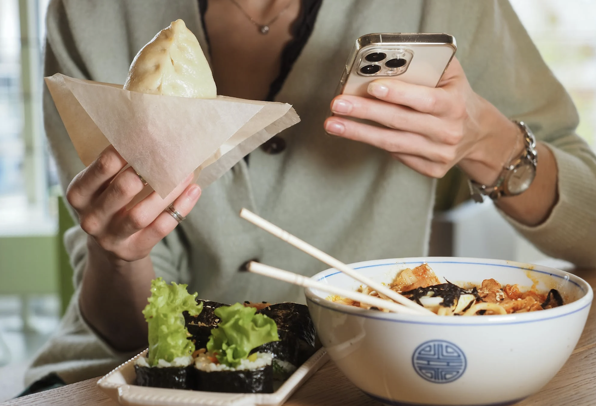 Women taking photo of food