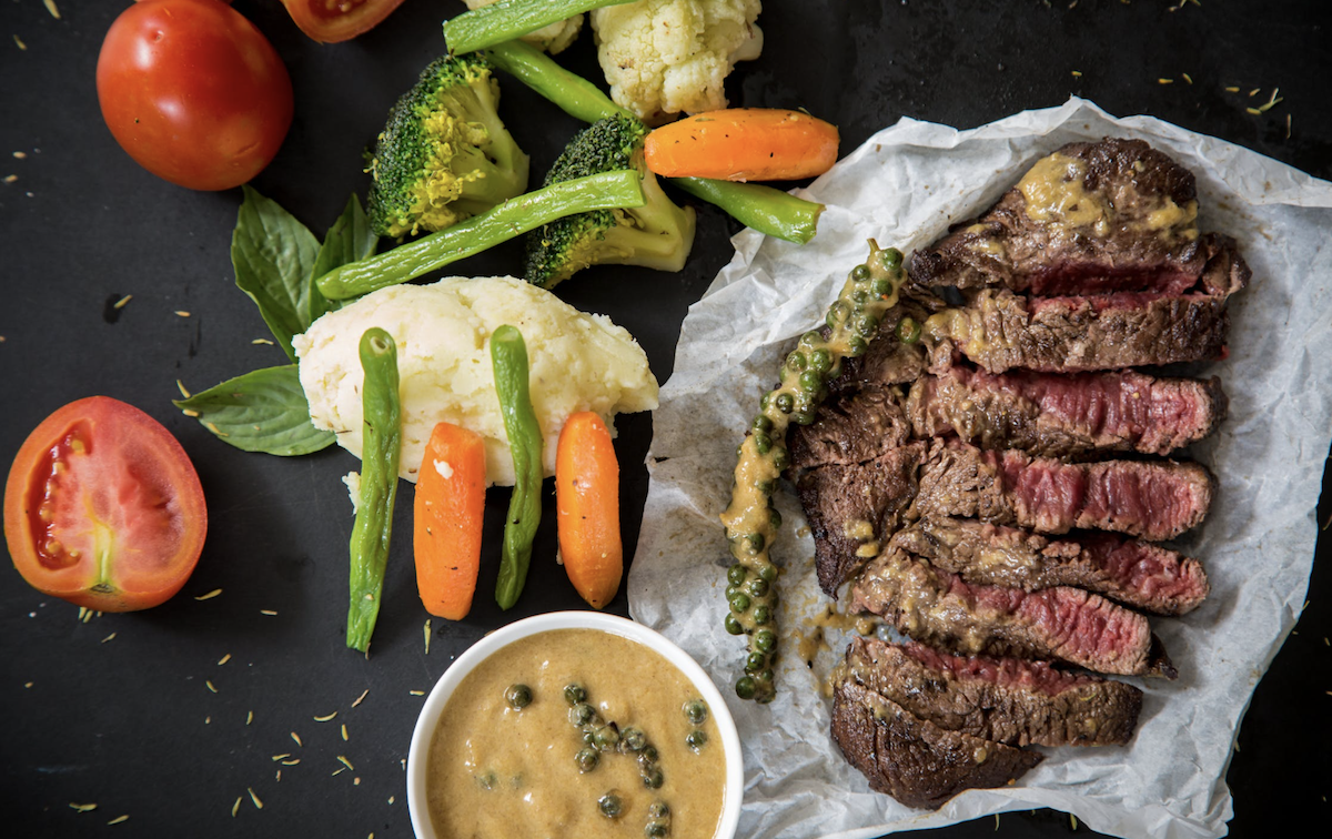 Plate of meat and vegetables