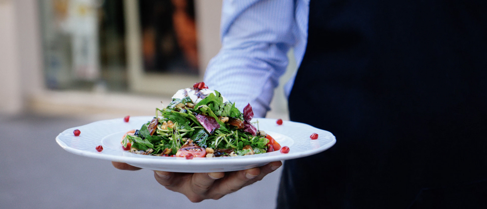 Waiter serving food