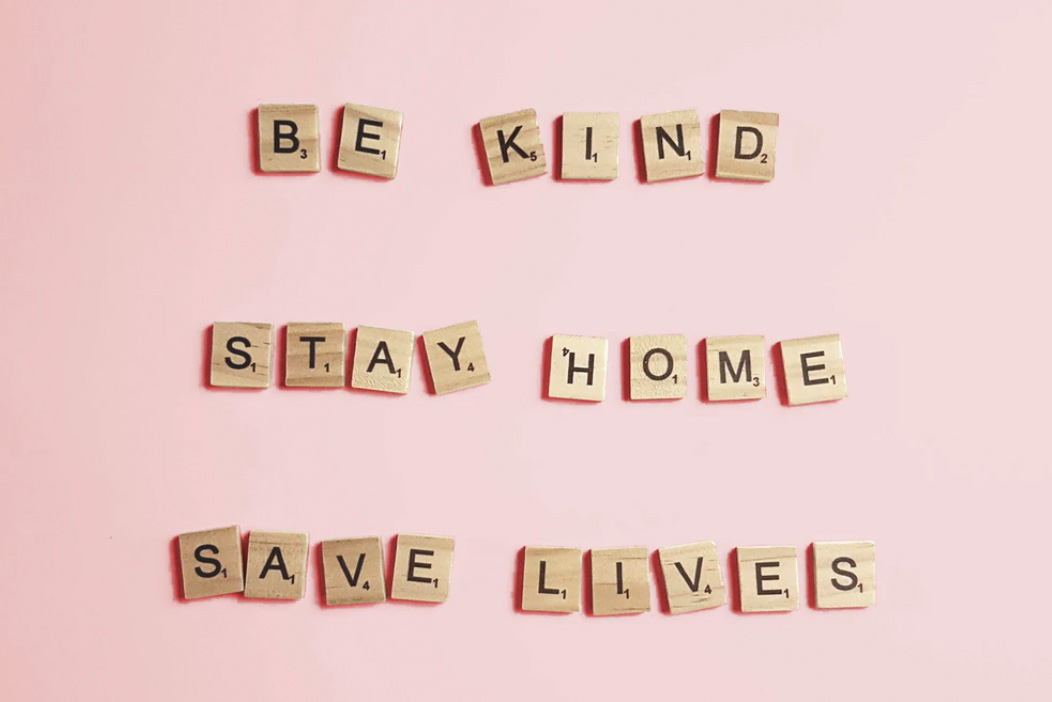 wooden tiles saying to be kind, stay home, save lives during COVID19