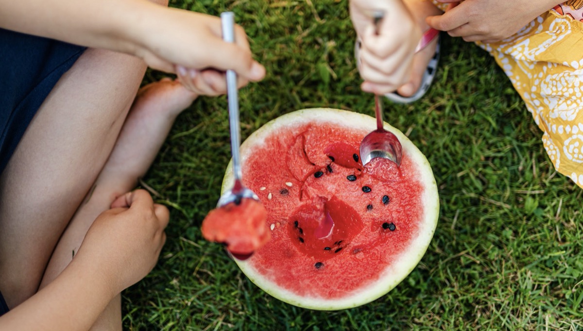 Children eating watermelon 